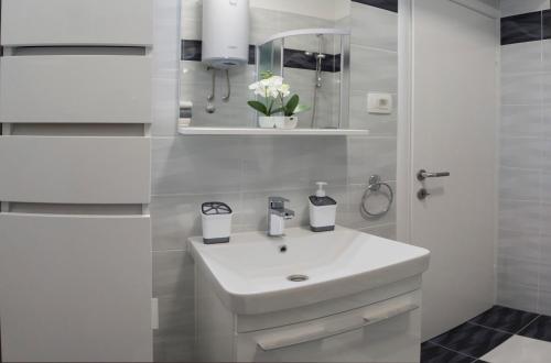Kylpyhuone majoituspaikassa Apartments Sevilja