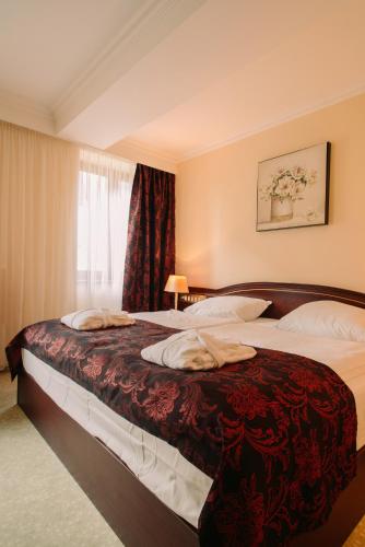 Postel nebo postele na pokoji v ubytování Grand Hotel Sole