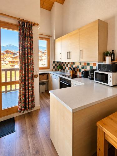 Duplex 7pers Belle Plagne ski aux pied 2chambres