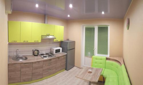 Kuchyňa alebo kuchynka v ubytovaní Apartment near metro Pozniaky