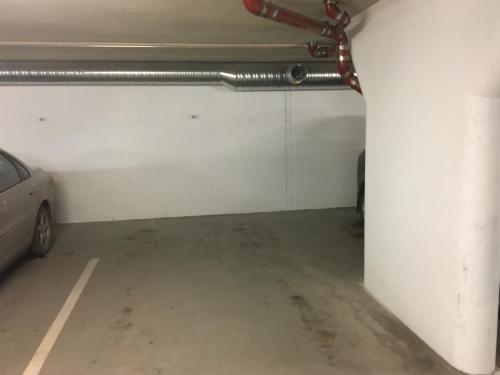 a parking garage with a car parked in it at Apartment Levi Star 1204 in Levi