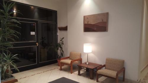 Ruang duduk di Apart Hotel Austral