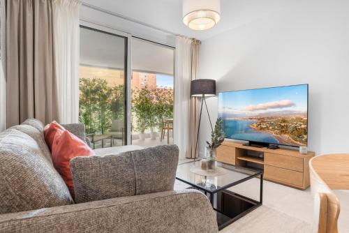 Modern Apartment Center Steps from the Beach