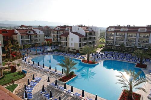 an overhead view of a large swimming pool in a resort at Barut B Suites in Side