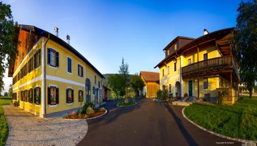 an empty street in front of a house at Weslhof in Attersee am Attersee