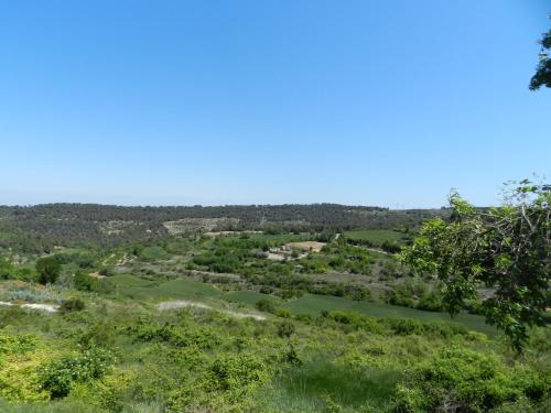 a view of the golf course from the top of a hill at Cal Feliuet in Passanant i Belltall