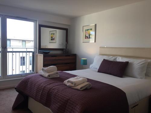 Katil atau katil-katil dalam bilik di Tolbooth Apartments by Principal Apartments