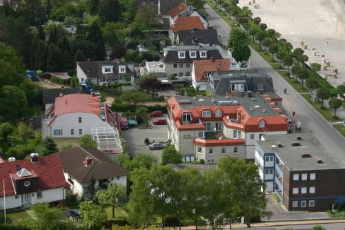 an aerial view of a town with houses at Hotel Seeterrassen in Laboe