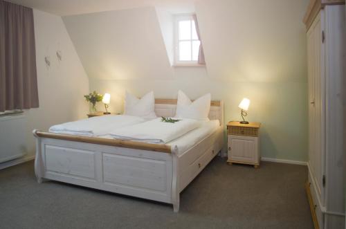 Ένα ή περισσότερα κρεβάτια σε δωμάτιο στο Gästehaus "Unsere Stadtvilla"