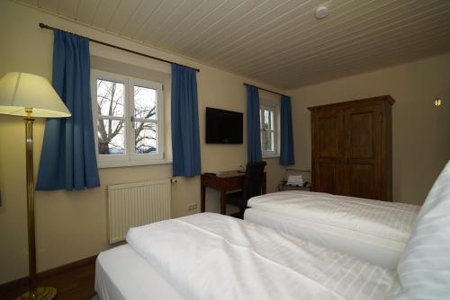 
Ein Bett oder Betten in einem Zimmer der Unterkunft Locanda del Castello
