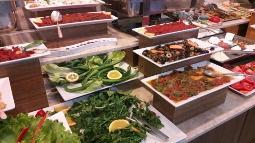 a buffet filled with lots of different types of food at Hotel Labella Bergama in Bergama