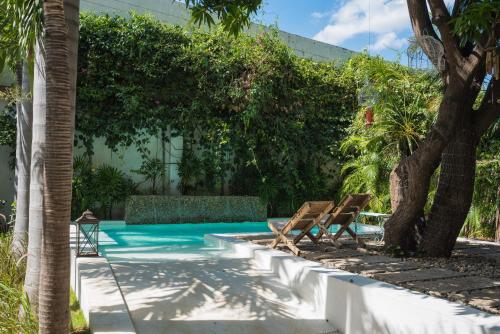 The swimming pool at or close to Hotel Boutique Casa Rosalía