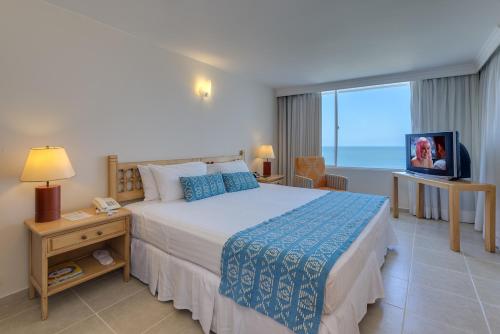 TV a/nebo společenská místnost v ubytování Hotel Dann Cartagena