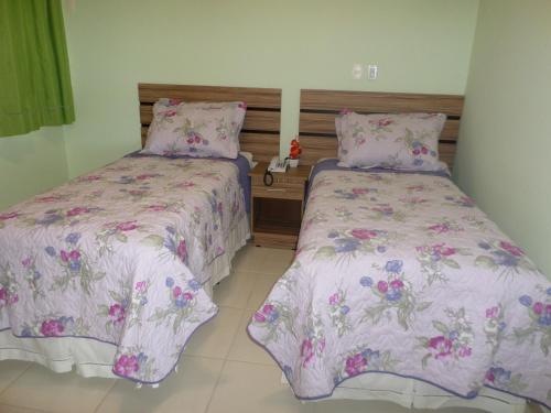 Katil atau katil-katil dalam bilik di Hotel Estrela Mares