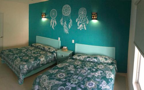 Katil atau katil-katil dalam bilik di Hotel Quinta Mar y Selva
