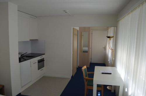 Cuisine ou kitchenette dans l'établissement Central Hotel Post