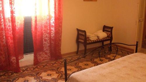 Ein Bett oder Betten in einem Zimmer der Unterkunft Dimora Adamo