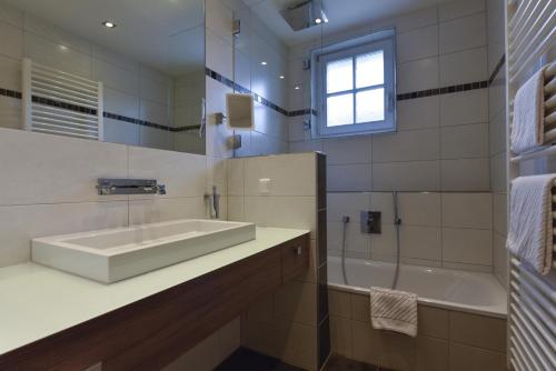 Kúpeľňa v ubytovaní Landhaus Alpinia