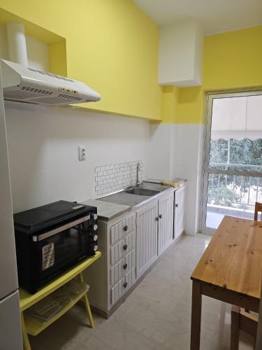 Yellow Blossom Apartment by Ori