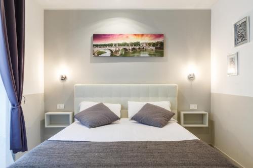 Postel nebo postele na pokoji v ubytování Sallustio Fine Rooms Guest House