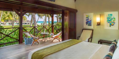 Postel nebo postele na pokoji v ubytování Paradise Sun Hotel Seychelles