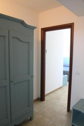 a door leading into a room with a doorway at Lido Impero in Palagiano