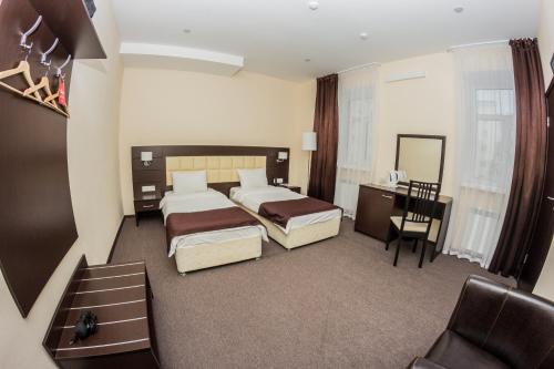 Кровать или кровати в номере Отель Островский