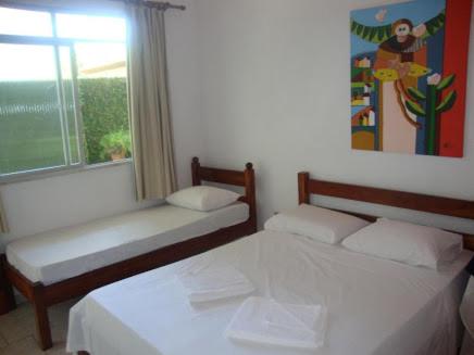 Postel nebo postele na pokoji v ubytování Hotel Pousada Terras do Sem Fim