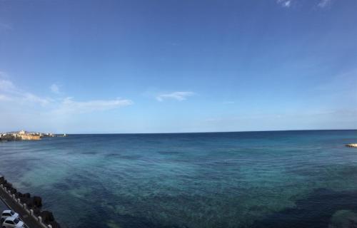 a view of the ocean from a beach at Luxury Loft on the Sea in Trapani