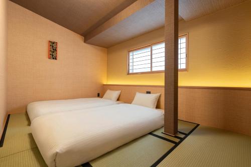 鶴Inn 難波 梅田 天王寺直通 バス2トイレ2 最大8名 鶴橋駅9分 花嵐居