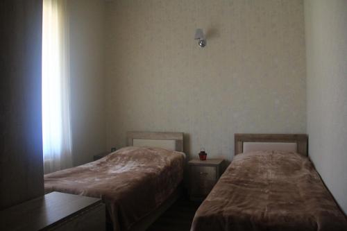 Postel nebo postele na pokoji v ubytování Guest house Fifty