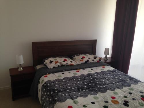 Cama o camas de una habitación en Playa Blanca La Serena