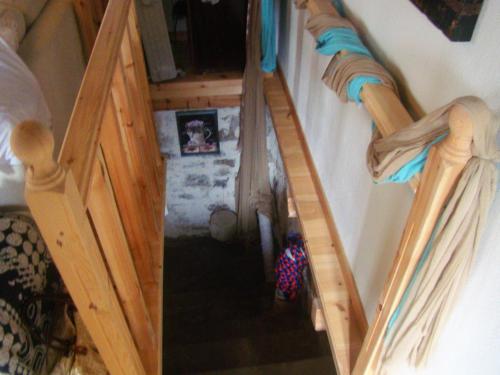 an overhead view of a staircase in a room at Alexadras Guesthouse in Ampelochórion