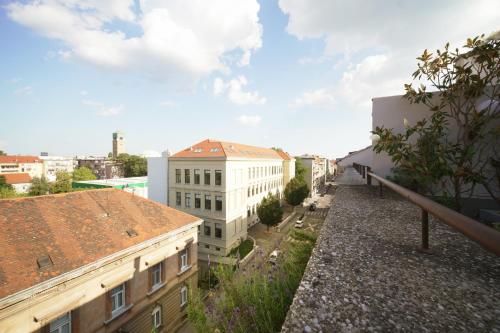 Architects Top Floor Oasis with Large Terrace