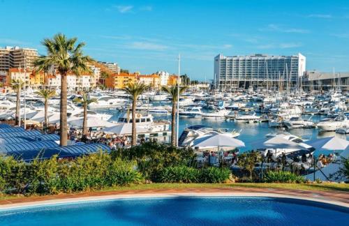 Charming Vilamoura Apartment with Private Garden & Pool