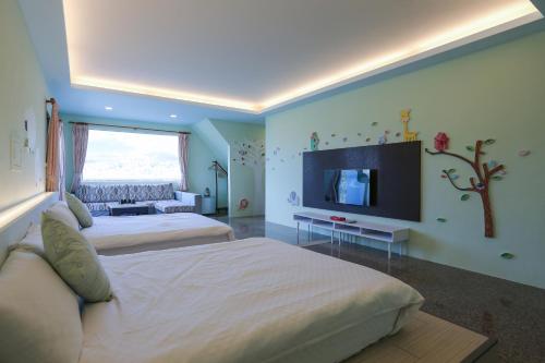 Un ou plusieurs lits dans un hébergement de l'établissement 樂樂堂旅店