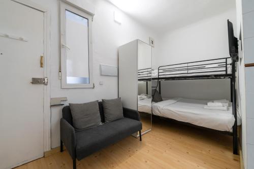 Loft Céntrico junto al Metro a 12 min de Plaza España con AC, WiFi y Lavadora