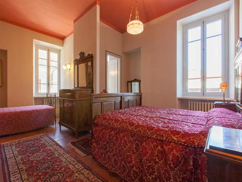 Ένα ή περισσότερα κρεβάτια σε δωμάτιο στο La Séca - Antico Albergo Alzese