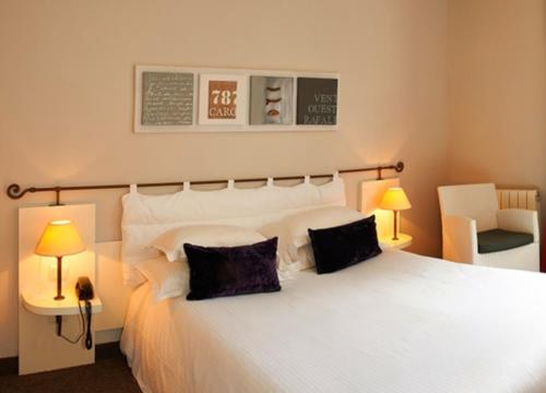 Posteľ alebo postele v izbe v ubytovaní Les Jardins D'Adalric