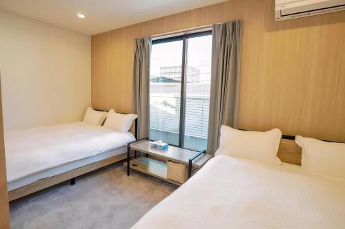 Ziyun , Newly built single family home with garden, 5 minutes to Namba, 4 bedrooms, 3 bathrooms, 3 washbasins, exclusive customized beautiful skin shower, free parking, suitable for family travel