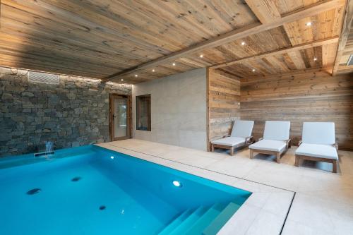 Chalet Mélèze, piscine intérieure, ski aux pieds et vue lac
