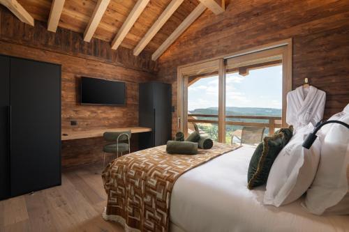 Chalet Mélèze, piscine intérieure, ski aux pieds et vue lac