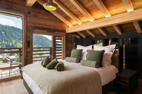 Chalet Mélèze, piscine intérieure, ski aux pieds et vue lac