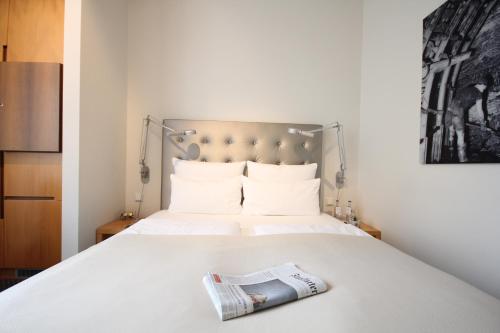 Cama o camas de una habitación en Hotel Maximilians