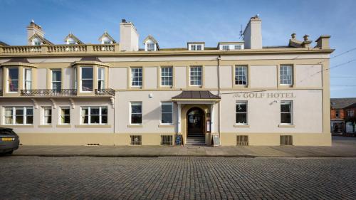 a large white building with the front of it at The Golf Hotel in Silloth