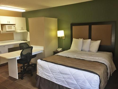 Un ou plusieurs lits dans un hébergement de l'établissement Extended Stay America Suites - Rochester - Henrietta