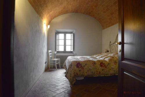 מיטה או מיטות בחדר ב-La Terrazza