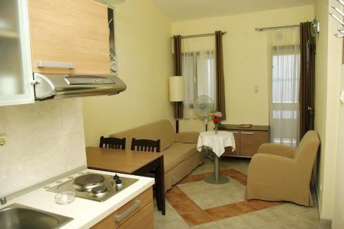 A kitchen or kitchenette at Hotel Priscapac Resort & Apartments