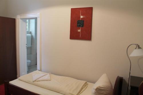 Ένα ή περισσότερα κρεβάτια σε δωμάτιο στο Hotel Pension Kima