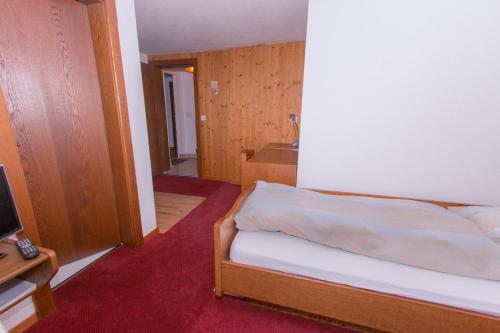 מיטה או מיטות בחדר ב-Monte Rosa